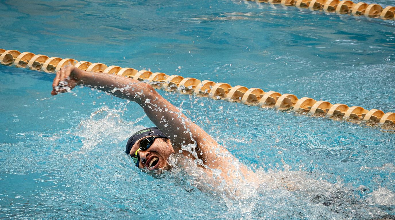 Adult swimmer building water confidence in the pool