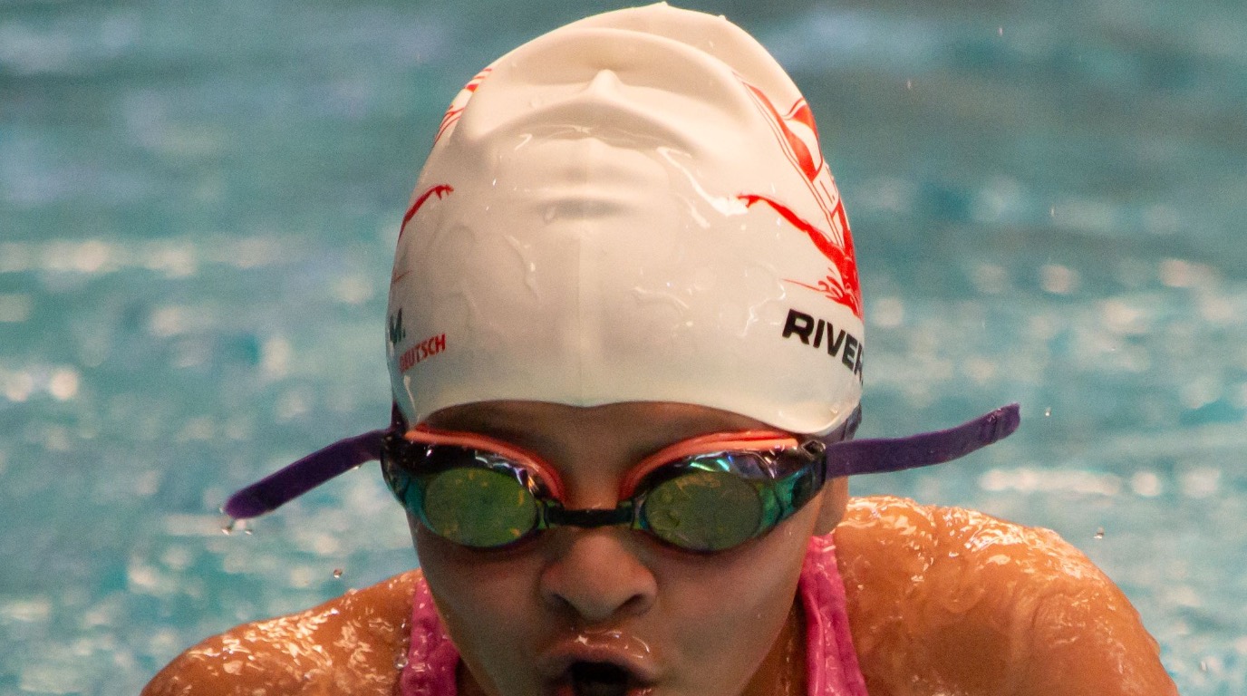 Junior competitive swimmer training stroke technique for race performance